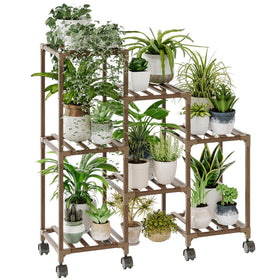 Bamworld plant stand with wheels displays seven pots for flexible indoor arrangement.