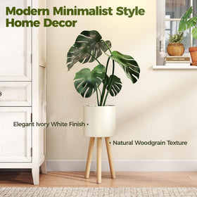 Bamworld white plant stand with wooden legs complements modern interiors.