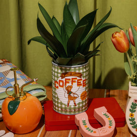 ban.do ceramic planter used as an organizer on a desk