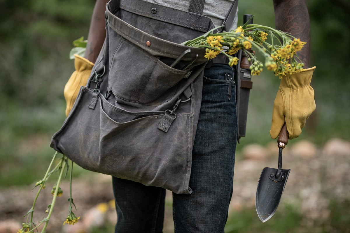 Barebones harvesting bag waxed canvas resists moisture for outdoor use.