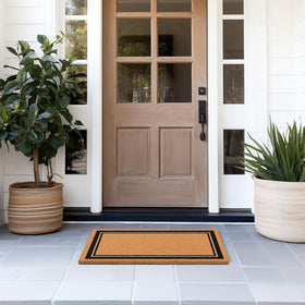 Barnyard Designs coco coir doormat front-door view emphasizes welcoming style.