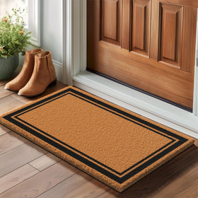 Barnyard Designs coir doormat with non-slip backing ensures stable placement.