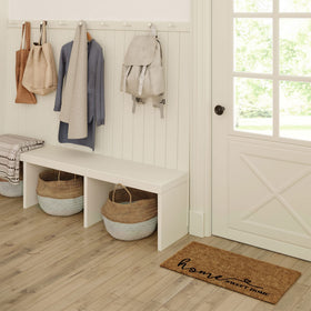 Barnyard Designs doormat features non-slip backing to stay in place.