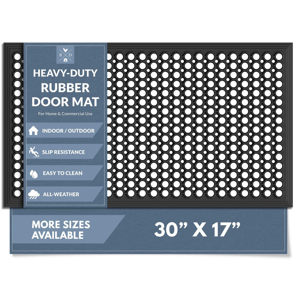 Barnyard Designs heavy-duty door mat with drainage holes keeps feet dry at entrances.