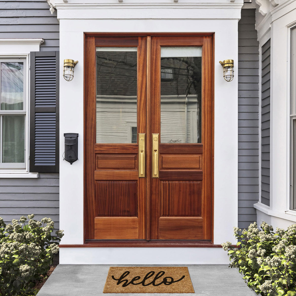 Barnyard Designs Hello Doormat brown text close-up shows bold welcoming message