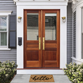 Barnyard Designs Hello Doormat brown text close-up shows bold welcoming message