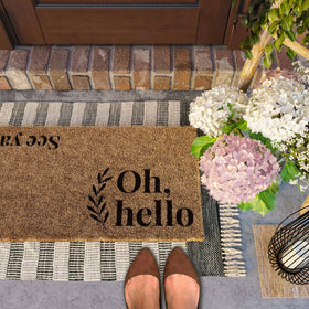 Close-up of the Oh Hello lettering on the Barnyard Designs doormat.
