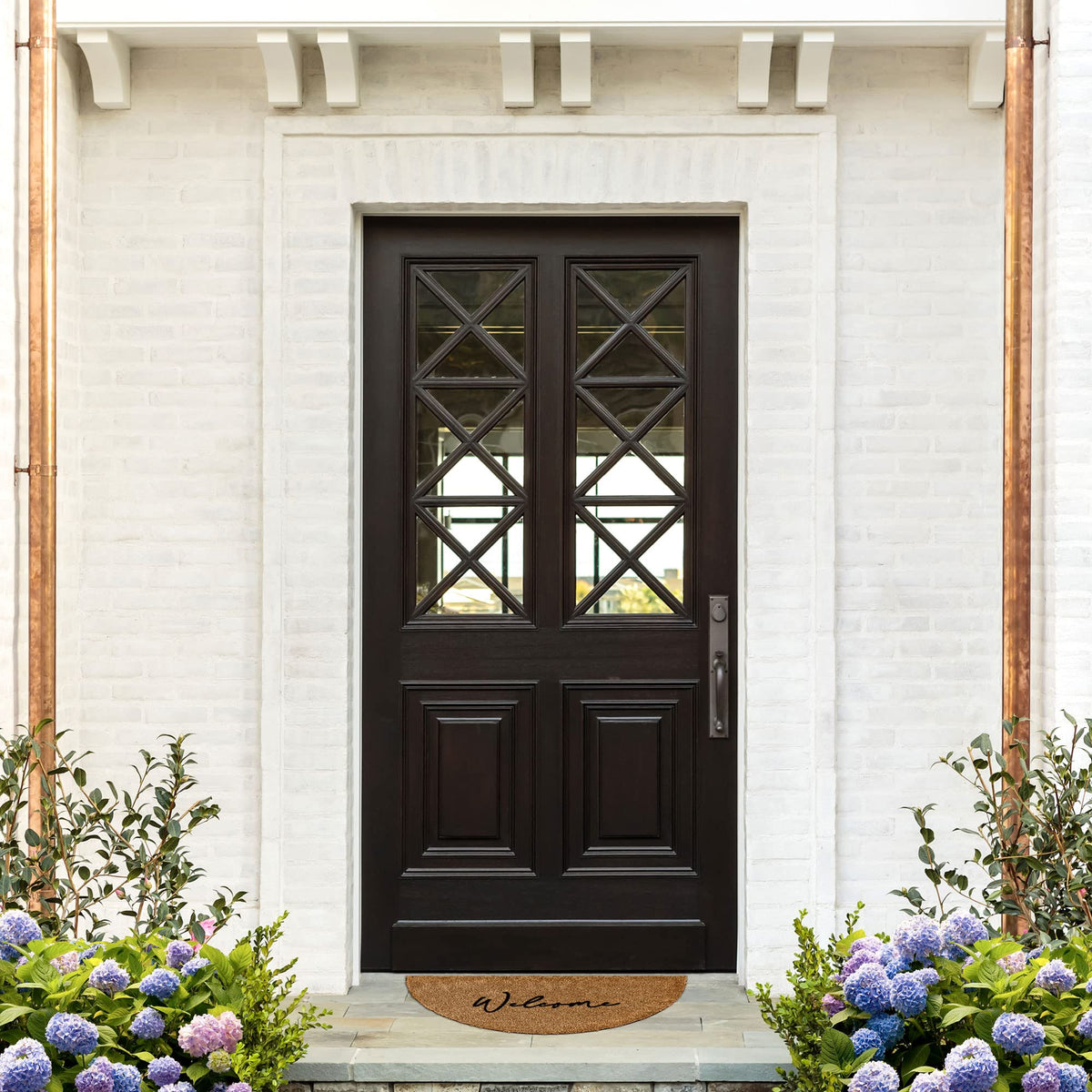 Barnyard Designs welcome mat for outdoor entry keeps a tidy inviting look