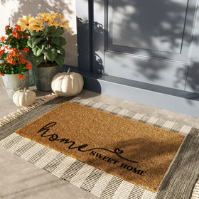 Barnyard Designs welcome mat for outdoor use with non-slip backing.