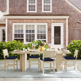 Basic Beyond elegant patio setup with navy cushions, indoor/outdoor versatility