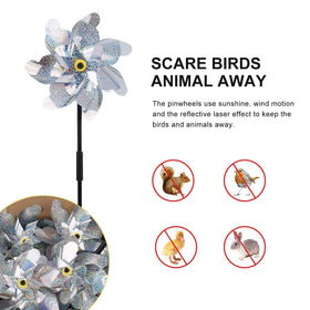 BATTIFE Bird deterrent pinwheel helps protect crops and flowers in the garden.