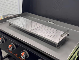 BBQ Future warming rack expands cooking area for simultaneous dishes