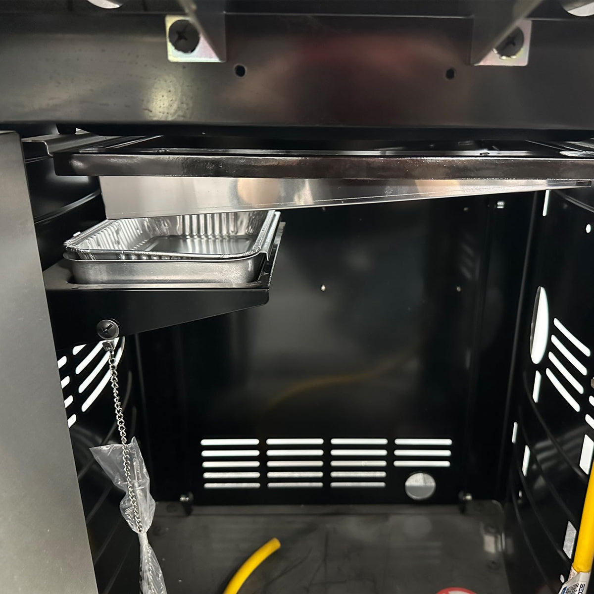 BBQ Future grease tray for Weber Genesis II keeps interior clean between cooks