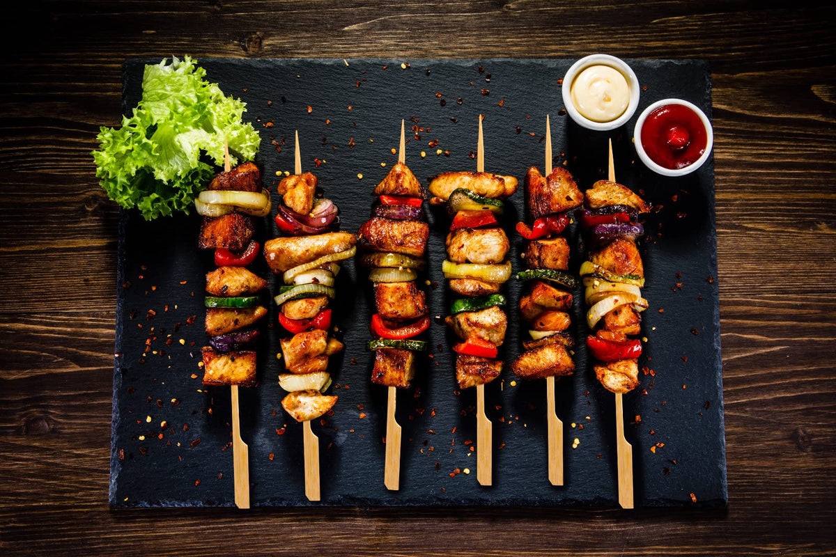 BBQStyle flat-handle paddle skewers reduce slipping while turning foods.