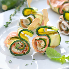 BBQStyle flat paddle skewers with a stable handle for easy flipping.