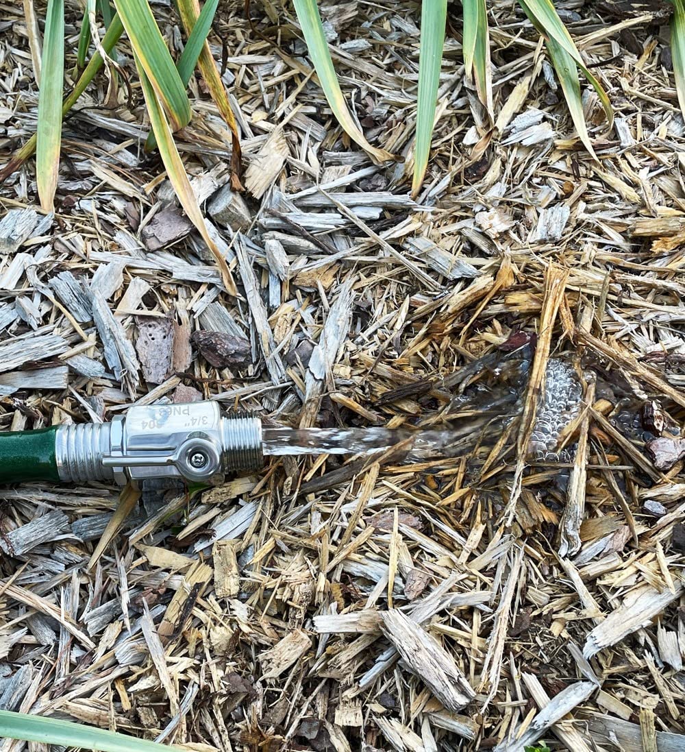 Beduan stainless steel valve installed on a garden hose setup for reliable watering.