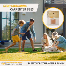 Bee Warehouse trap in use on exterior wood for seasonal protection.
