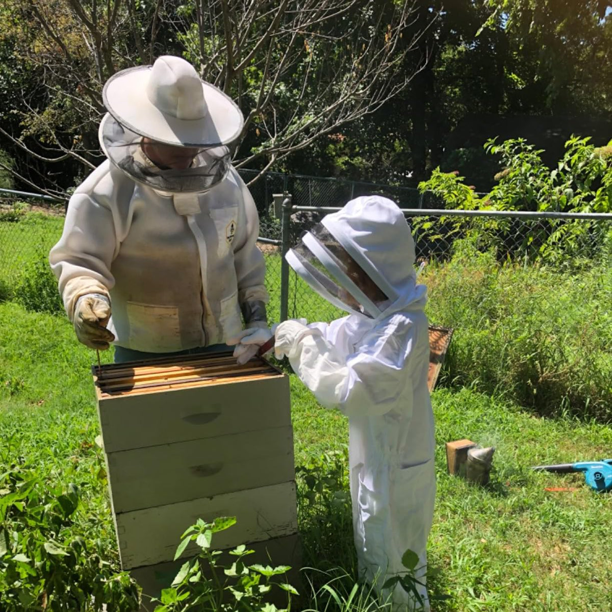 BEEXTM Kids Bee Suit neck zipper detail enables easy removal of the hat portion.