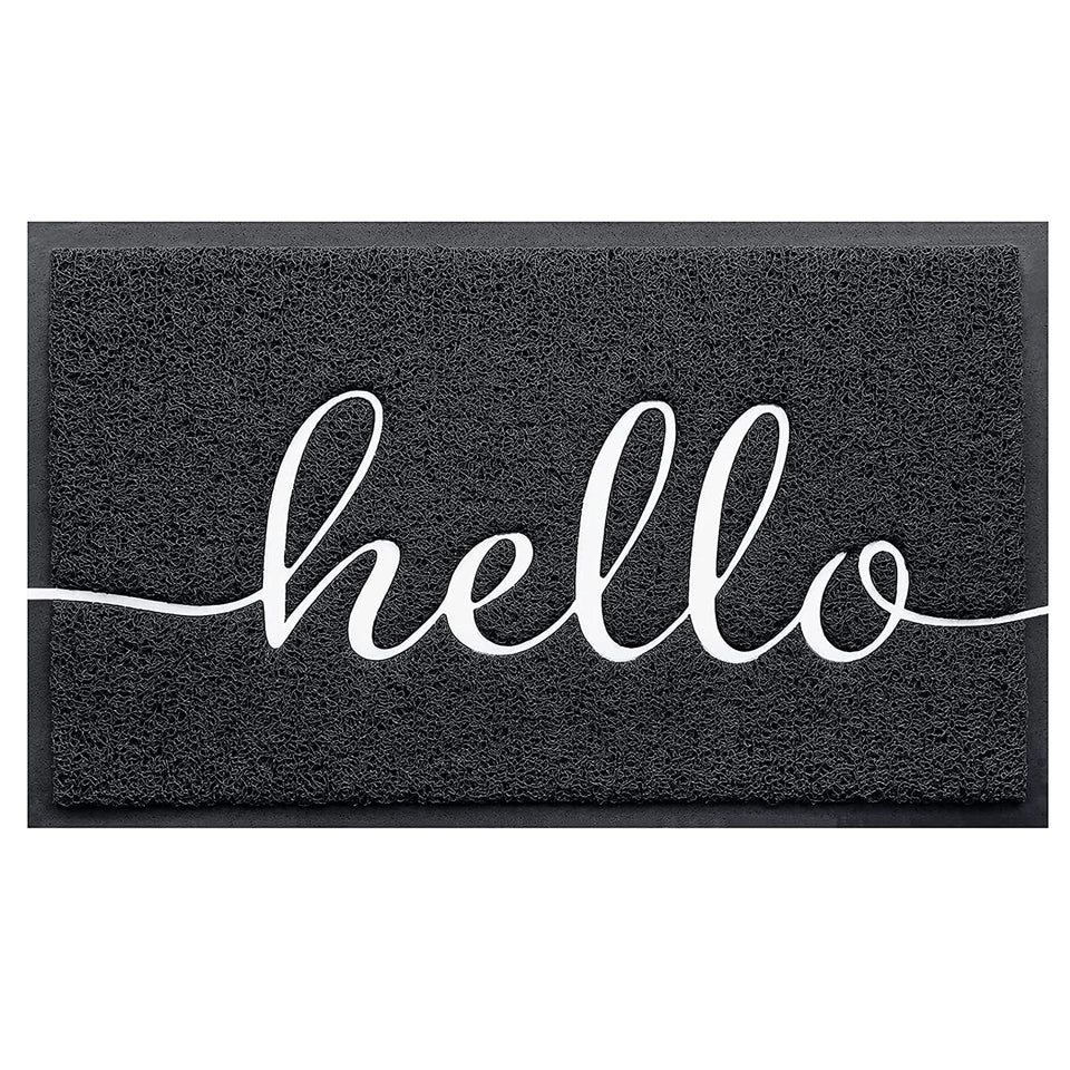 BeneathYourFeet hello-embossed mat traps dirt at the threshold.