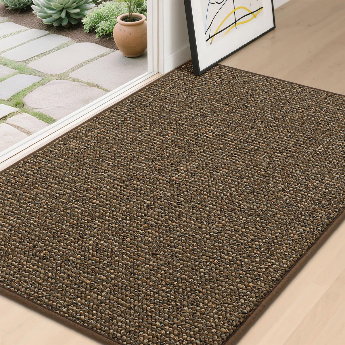 BEQHAUSE Dirt Trapper front door mat captures dirt and keeps floors cleaner.