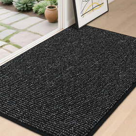 BEQHAUSE Dirt Trapper front door mat traps dirt and keeps entry floors dry.