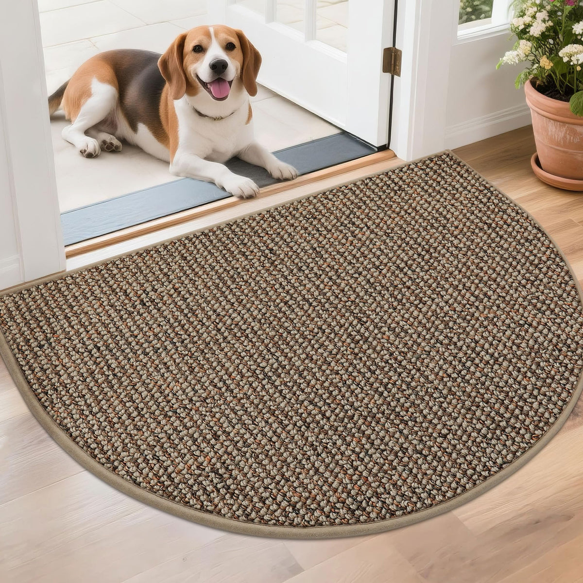 BEQHAUSE Dirt Trapper semi-circle mat in taupe traps dirt at the doorway.