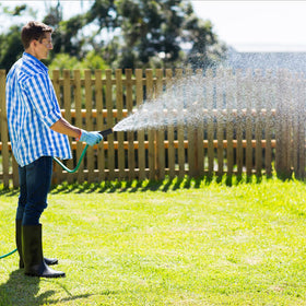 Besiter brass nozzle in use for car washing and patio cleaning showing multi-purpose value.