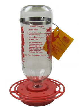 Best-1 glass hummingbird feeder side view showing clear reservoir for nectar monitoring.