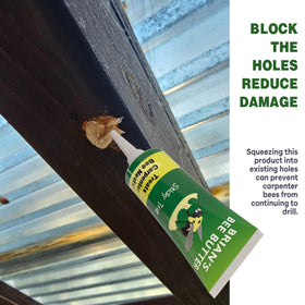 Traps placed on wood surfaces demonstrate outdoor pest control.