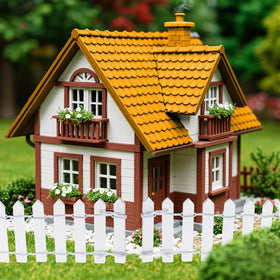 Bewudy fairy garden prop with plants, enhances scene depth.