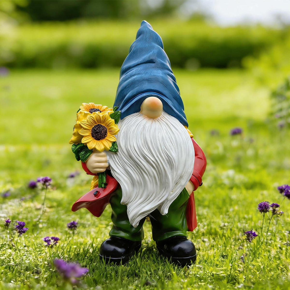 Bezseili Garden Gnome with sunflower bouquet brightens outdoor spaces.