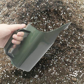 Bibabala garden shovel army green, potting use beside a plant, convenient for repotting.