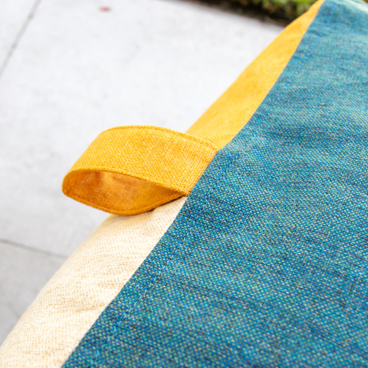 On-the-go handle on Big Joe Patio Square Ottoman for easy transport