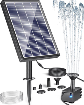 Biling solar water pump in a bird bath delivering a gentle fountain in bright sunlight