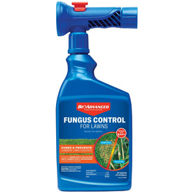 BioAdvanced Fungus Control bottle attached to a hose for easy lawn treatment.