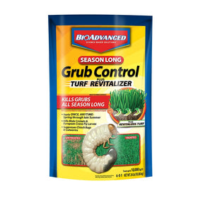 BioAdvanced Season Long Grub Control granules spread across a lush lawn for stronger roots