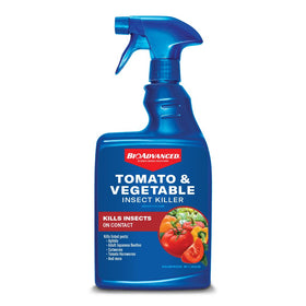 BioAdvanced tomato and vegetable pest-control bottle shown outdoors for garden use.