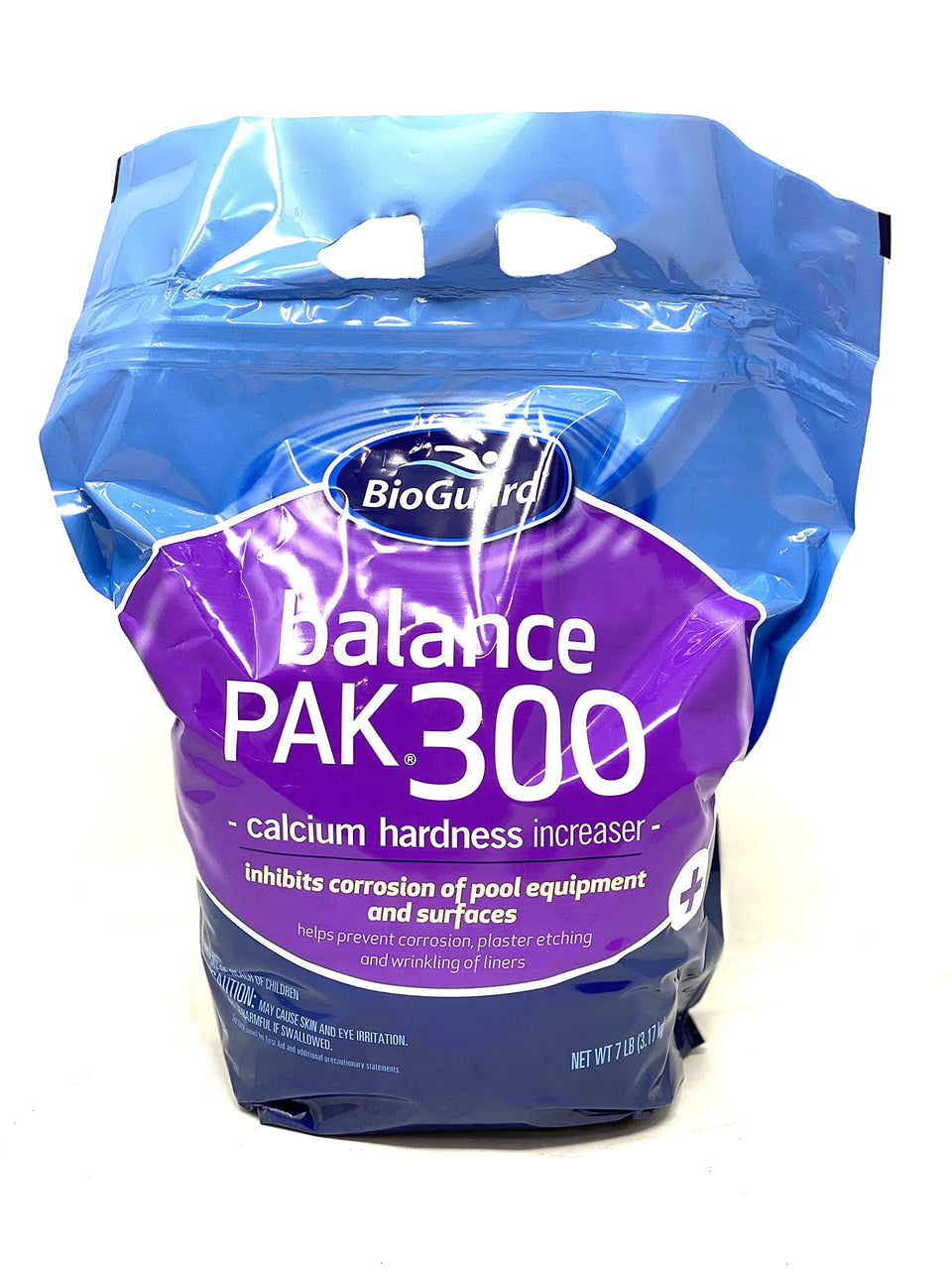 BioGuard Balance Pak 300 pellets dissolving quickly to raise calcium hardness for clearer pool water.
