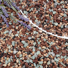 BIOMAND lava rocks used as top dressing to add texture and moisture control features.