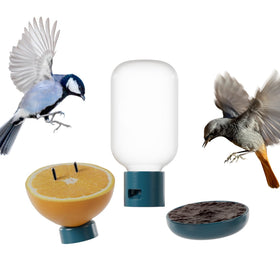 Bird Buddy water fountain mounted on the feeder for easy bird hydration.