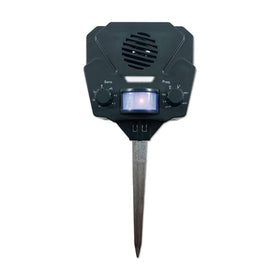 Bird-X Solar Yard Gard outdoor unit in sunny garden providing deterrence against wildlife