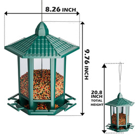 Birdream pagoda green feeder, filled with seeds, inviting cardinals and goldfinches