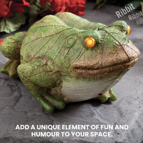 Bits and Pieces 6-12in sensor range frog keeps watch along pathways.