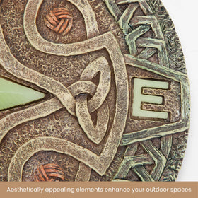 Bits and Pieces Celtic compass decorative stone adds charm to lawn edges.