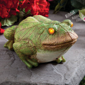 Bits and Pieces frog eyes light up at dusk for an inviting garden glow.