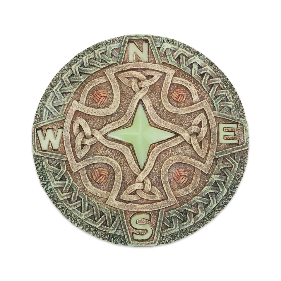 Bits and Pieces glow-in-the-dark Celtic compass stone lights up the garden at night.