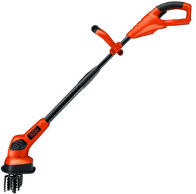 BLACK+DECKER LGC120B tiller in action breaks soil and aerates efficiently.