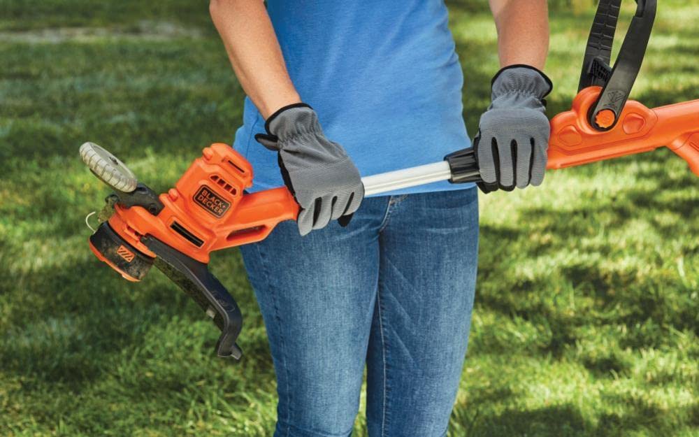 BLACK+DECKER wheeled edge guide helps finish borders along driveways and beds.