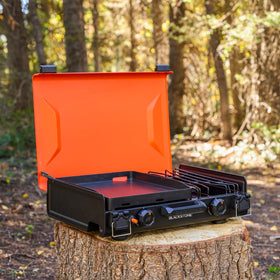 Blackstone 2364 camping griddle in use at the beach