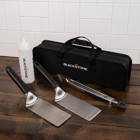 Blackstone 5481 spatulas demonstrate wide, efficient flipping for quick, even griddle foods.